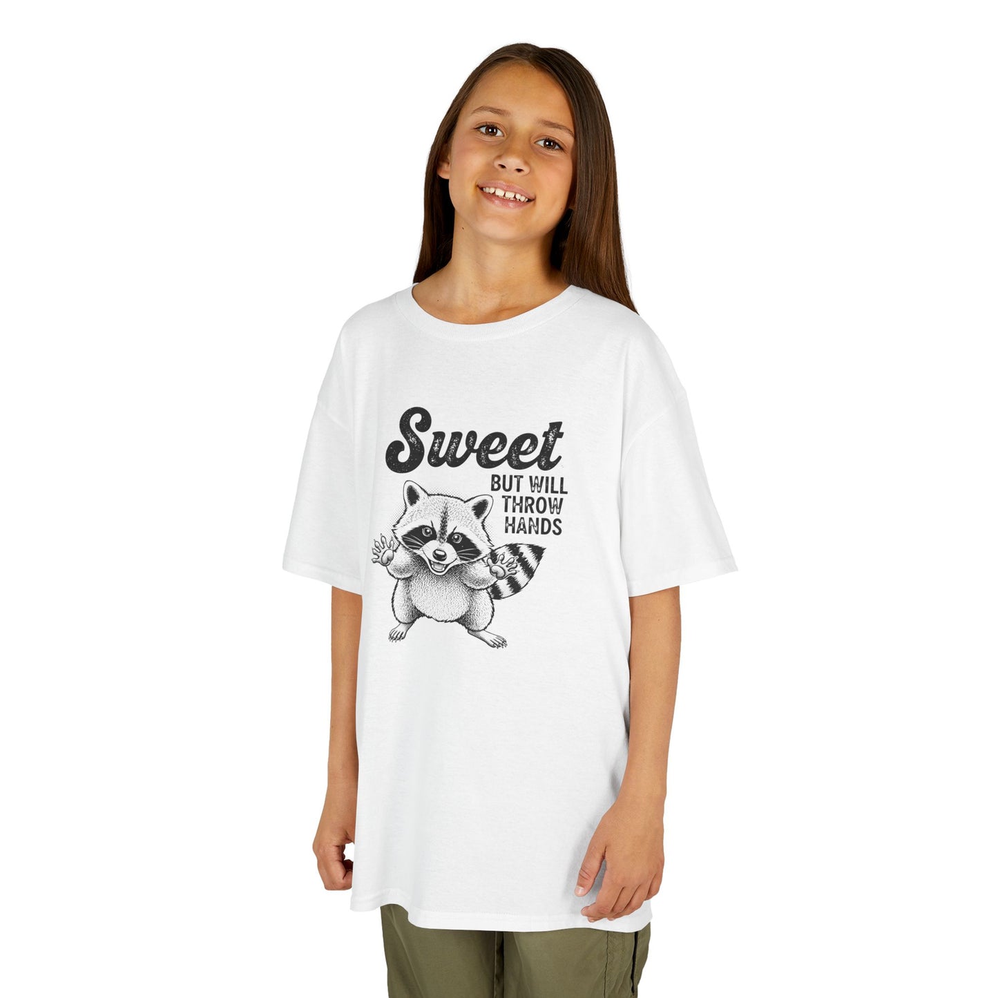 Child wearing a white t-shirt with a raccoon graphic and text on a white background