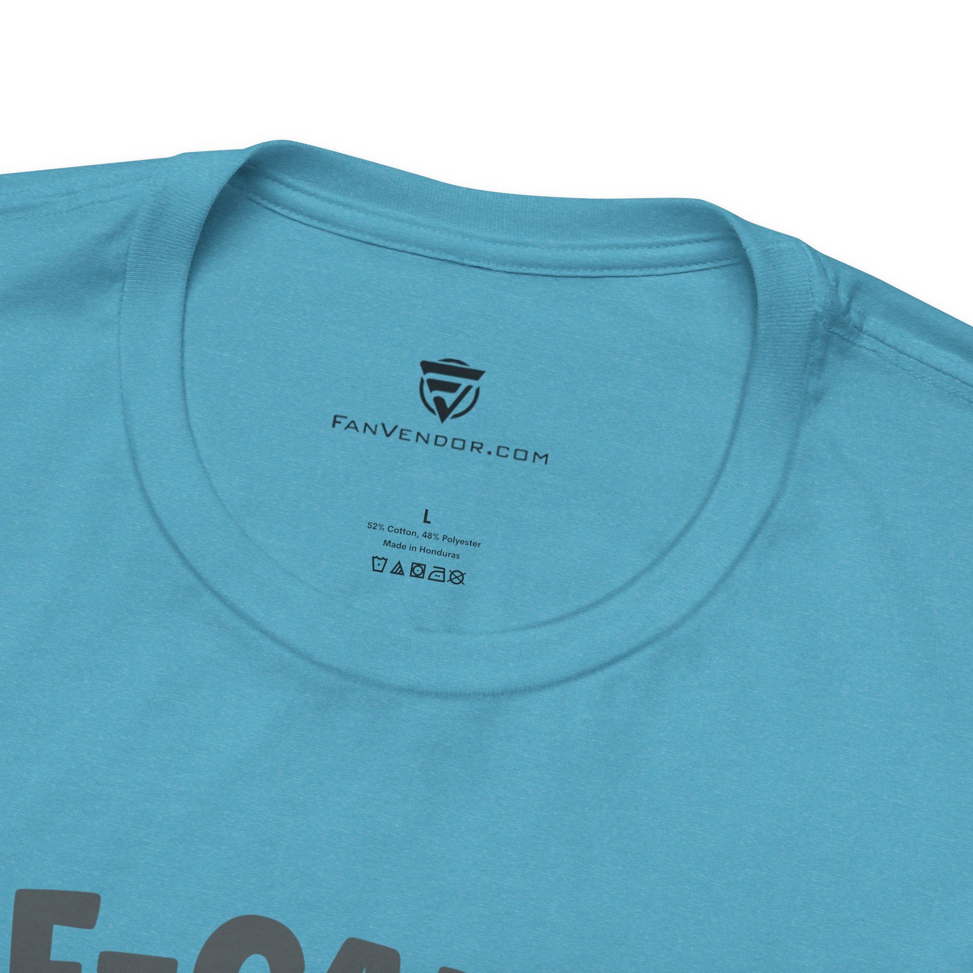 Close-up of a blue t-shirt with 'FanVendor.com' logo and text 