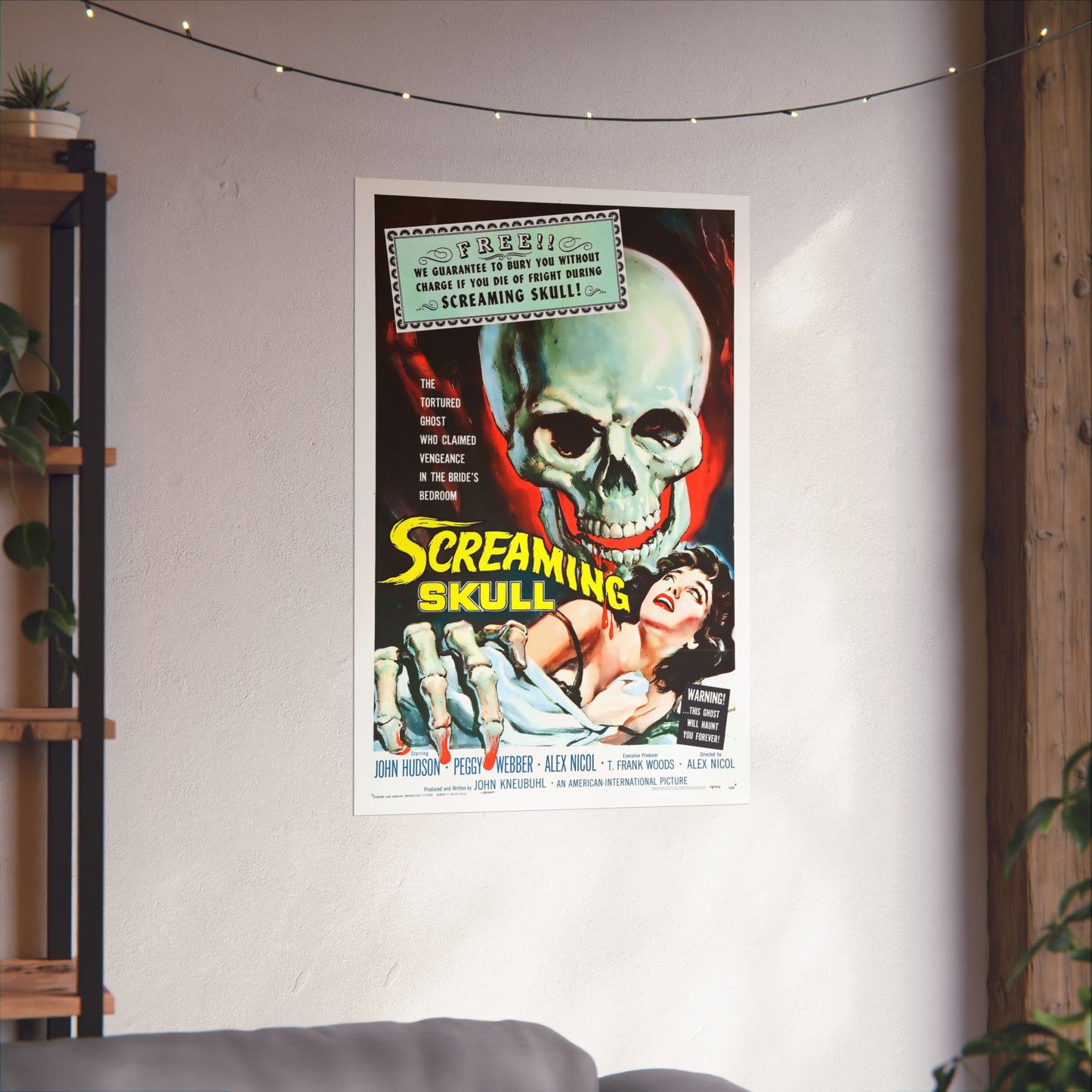 Vintage movie poster of 'Screaming Skull' on a wall in a room with plants and a shelf.