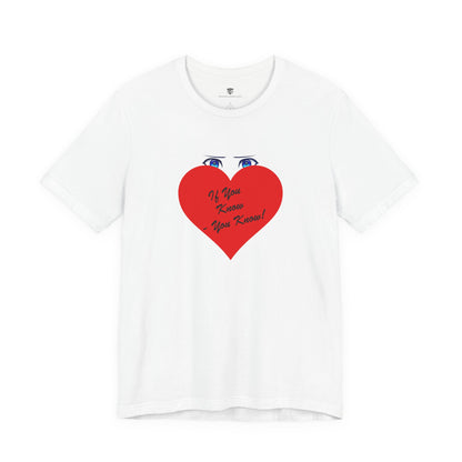 White t-shirt with a red heart graphic and text on a white background