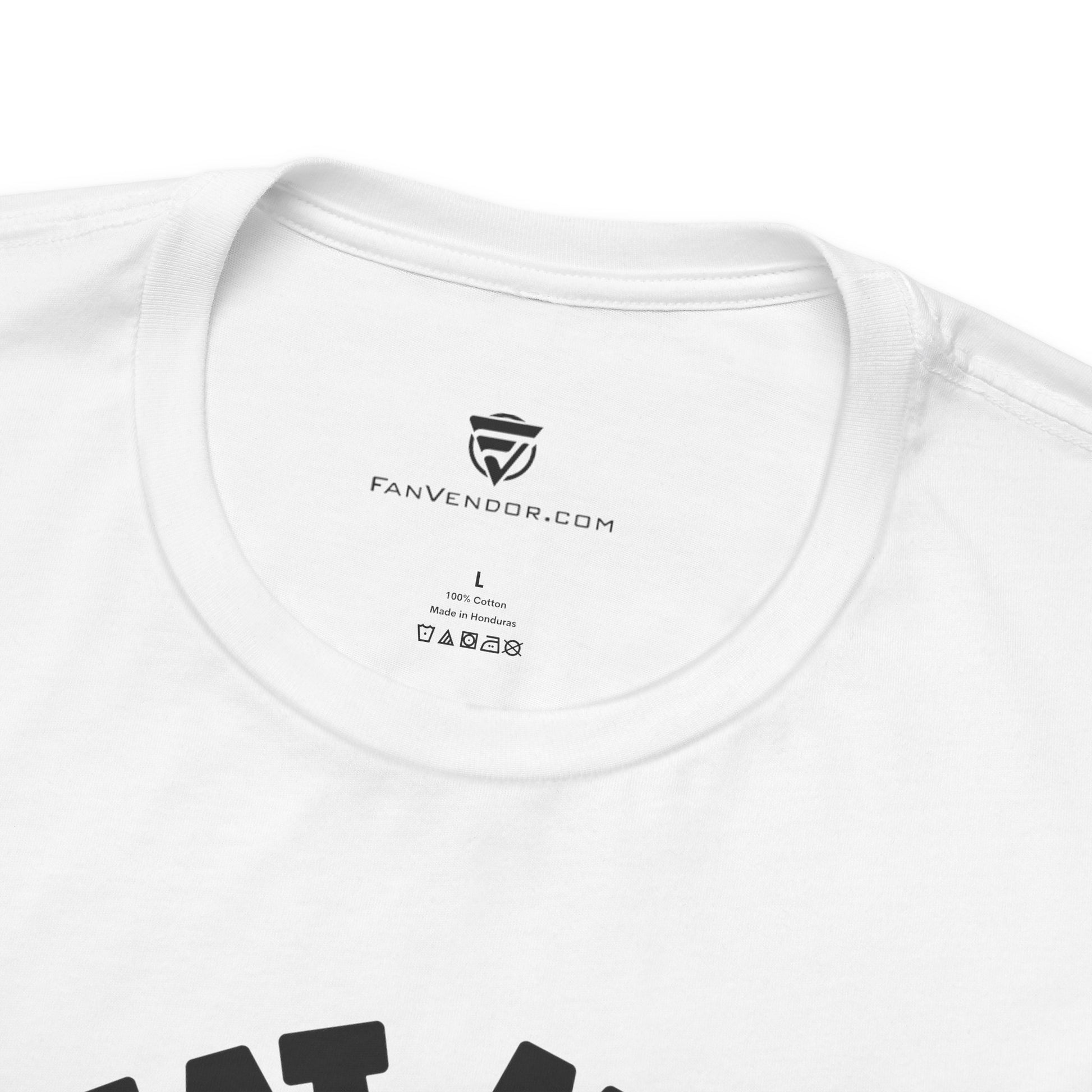 Close-up of a white t-shirt with 'FanVendor.com' branding on the collar.