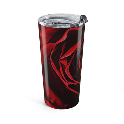 Tumbler with red and black abstract design on a white background