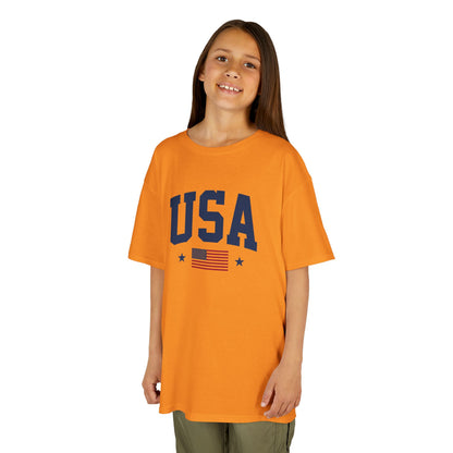 Child wearing an orange 'USA' t-shirt with a white background