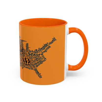 Orange mug with black text design on a white background