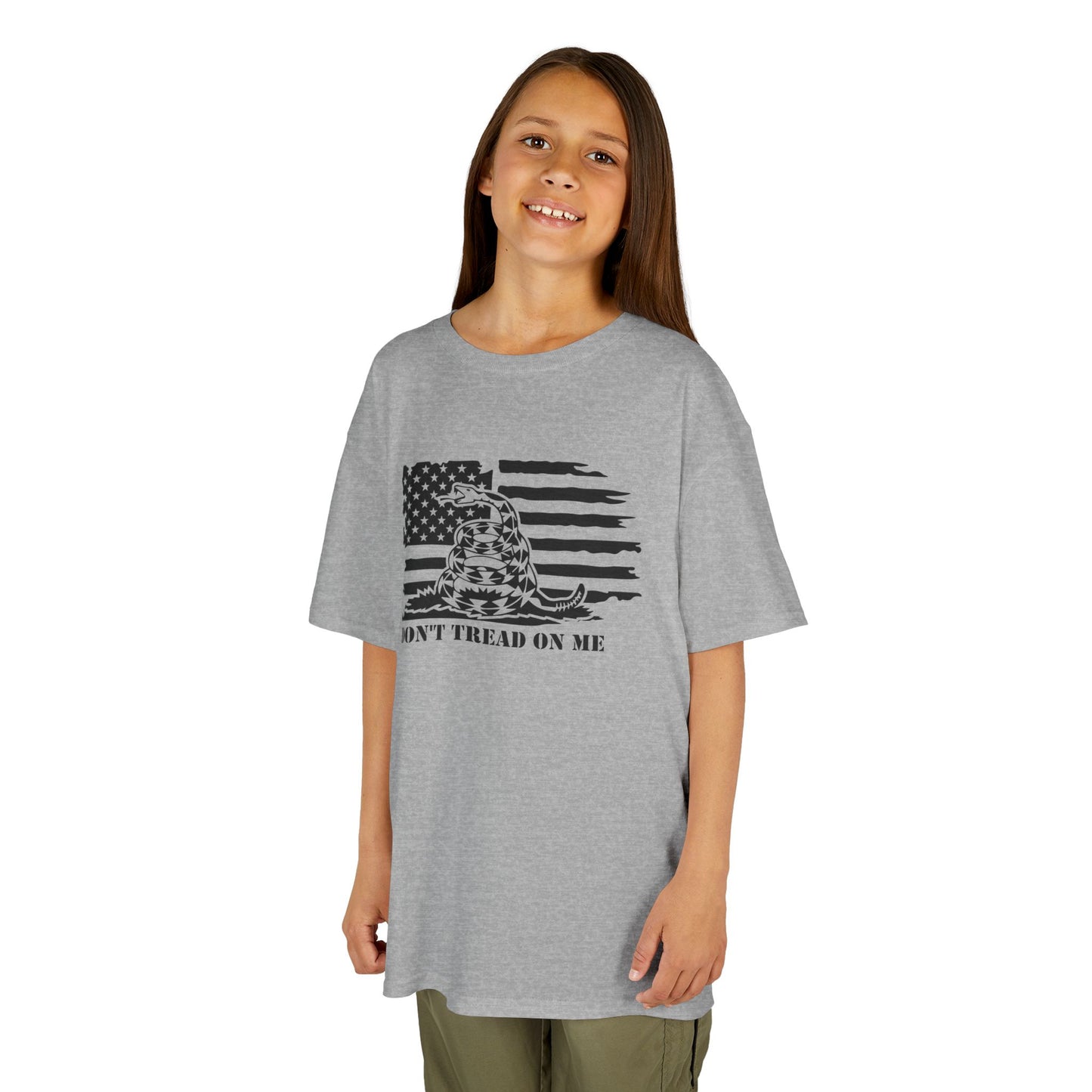 Girl wearing a gray t-shirt with a flag graphic and text on a white background