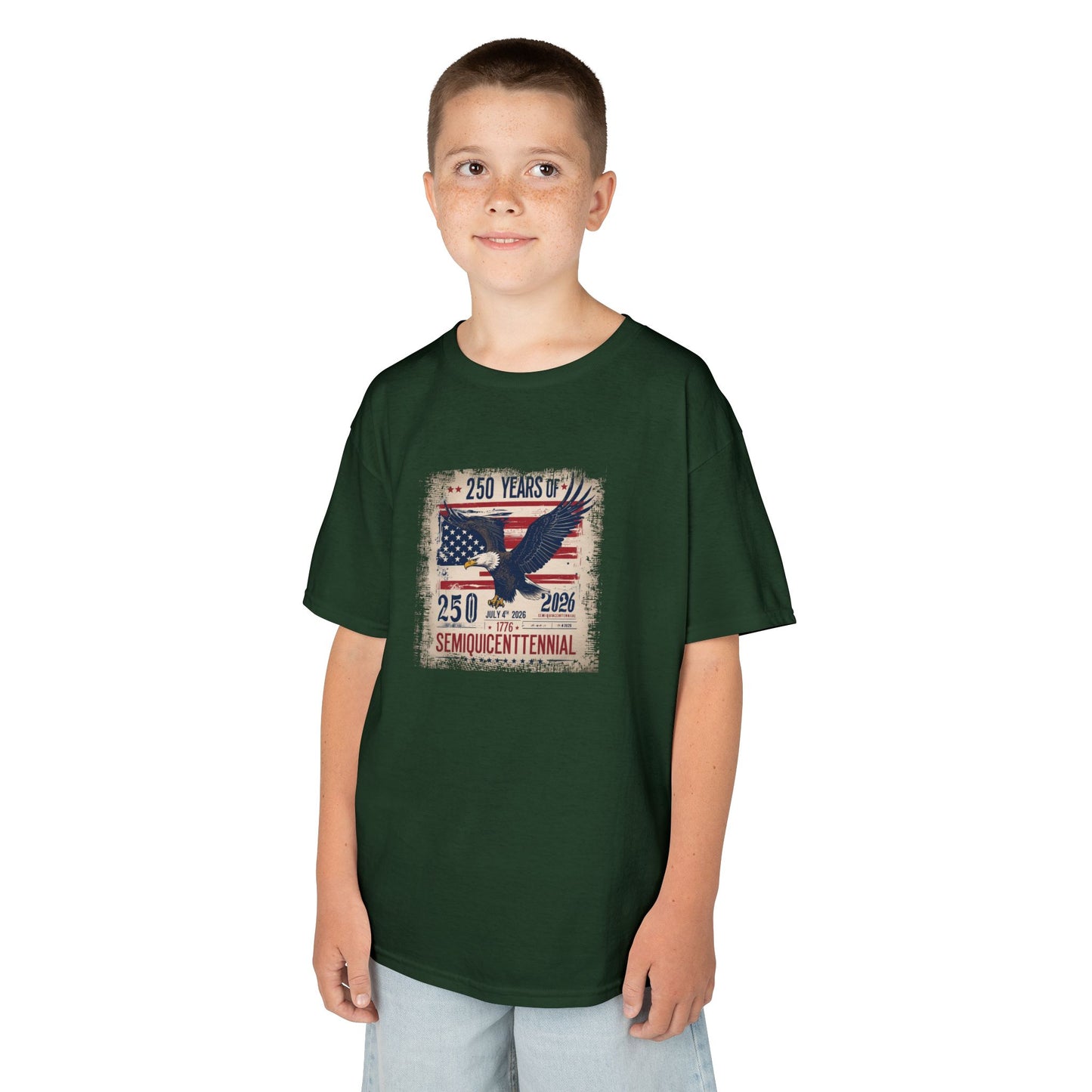 Child wearing a green t-shirt with a graphic design on a white background