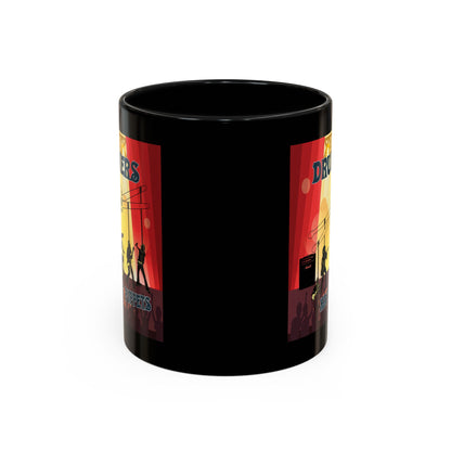 Black mug with colorful graphic design on a white background