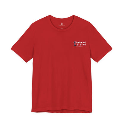 Red t-shirt with a small logo on the chest against a white background
