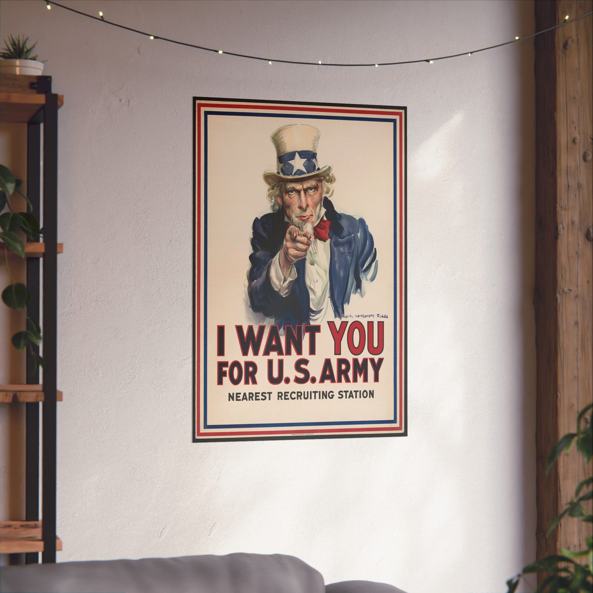 Vintage-style 'I Want You for U.S. Army' poster on a wall in a room with a shelf and plants.