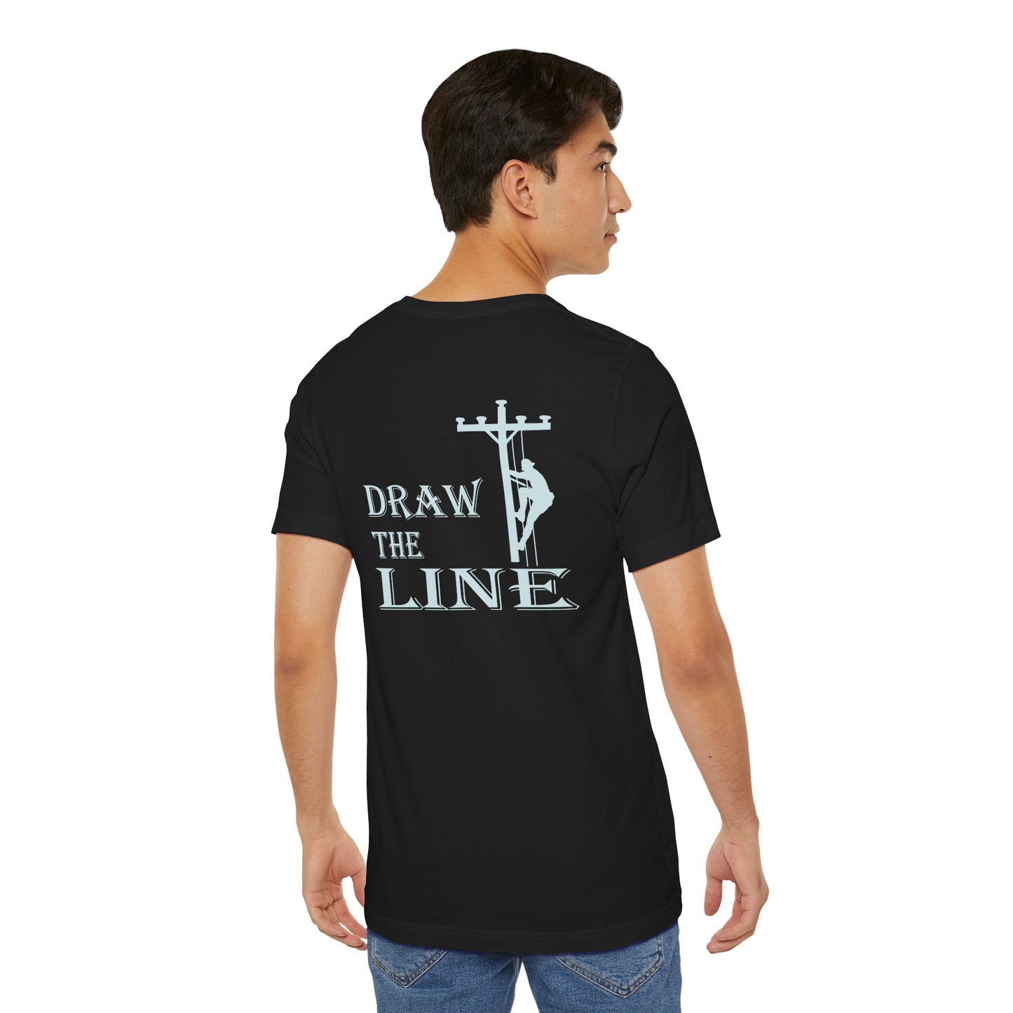 Person wearing a black t-shirt with 'Draw the Line' graphic and text on the back.