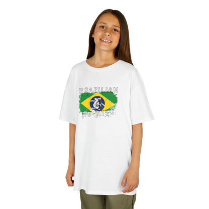 Young girl wearing a white t-shirt with Brazilian flag design and 'Brazilian Jiu-Jitsu' text on a white background