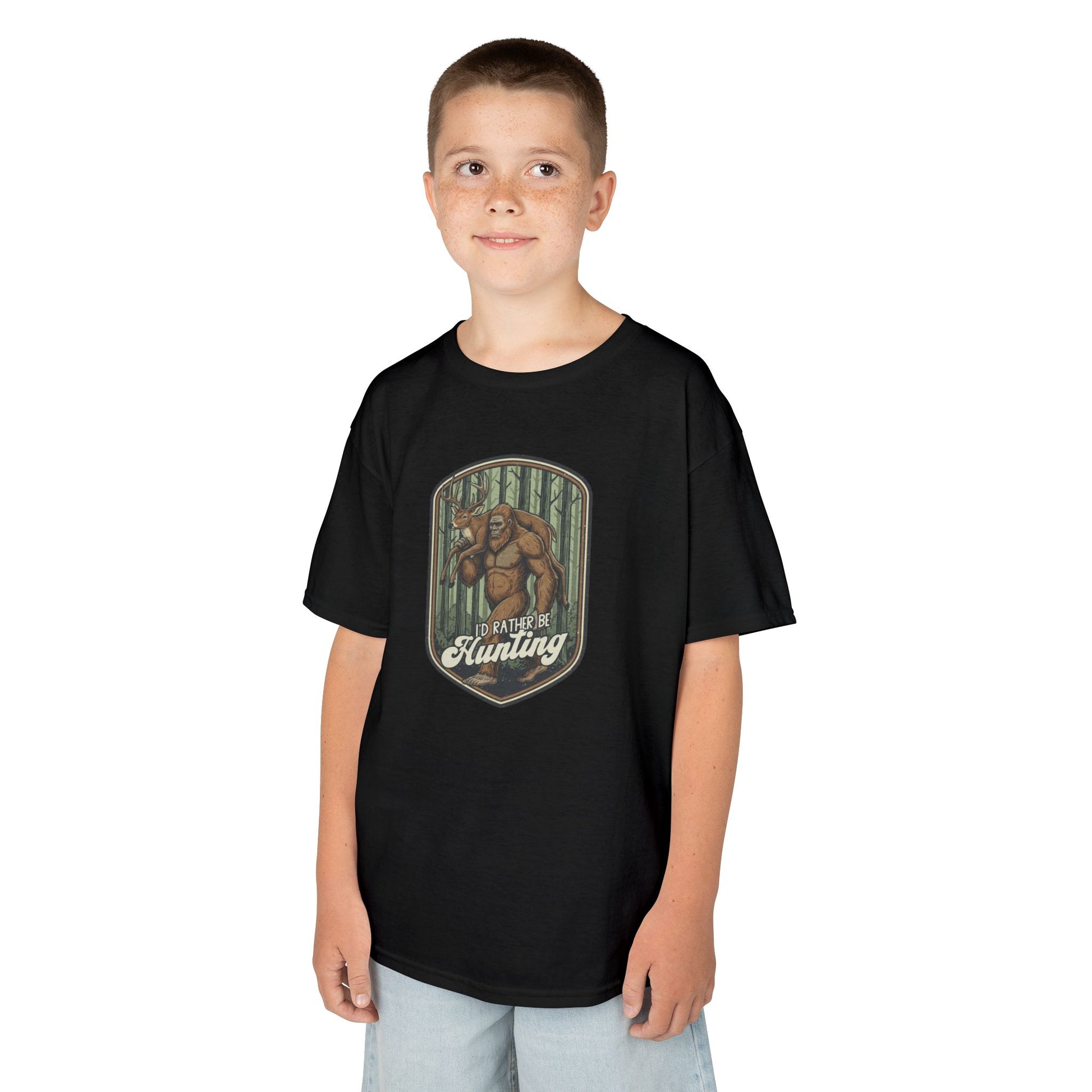 Child wearing a black t-shirt with a graphic design on a white background