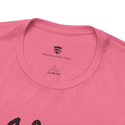 Close-up of a pink t-shirt with 'FanVendor.com' logo and text 