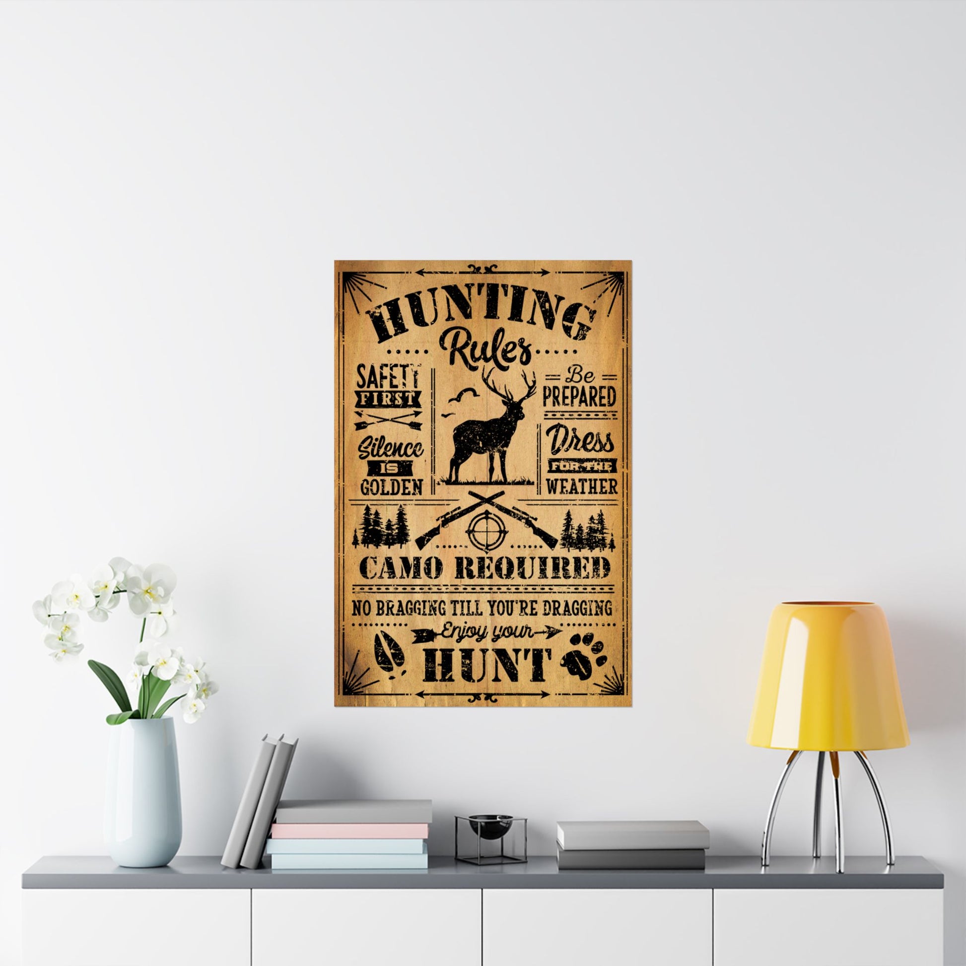 Hunting rules poster on a wall above a shelf with decor items.