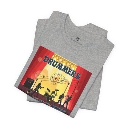 Gray t-shirt with a colorful graphic design featuring silhouettes of drummers and text on a white background.