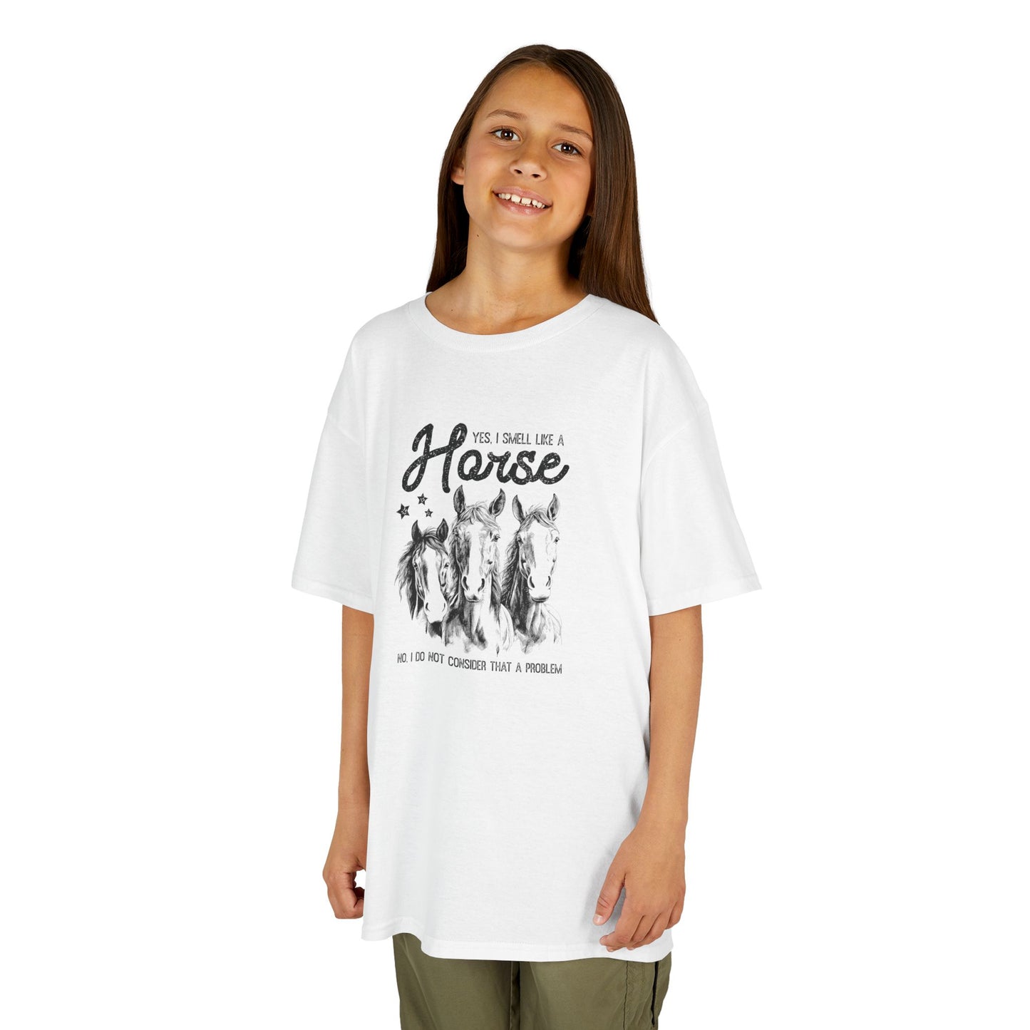 Young girl wearing a white t-shirt with horse graphic and text on a white background