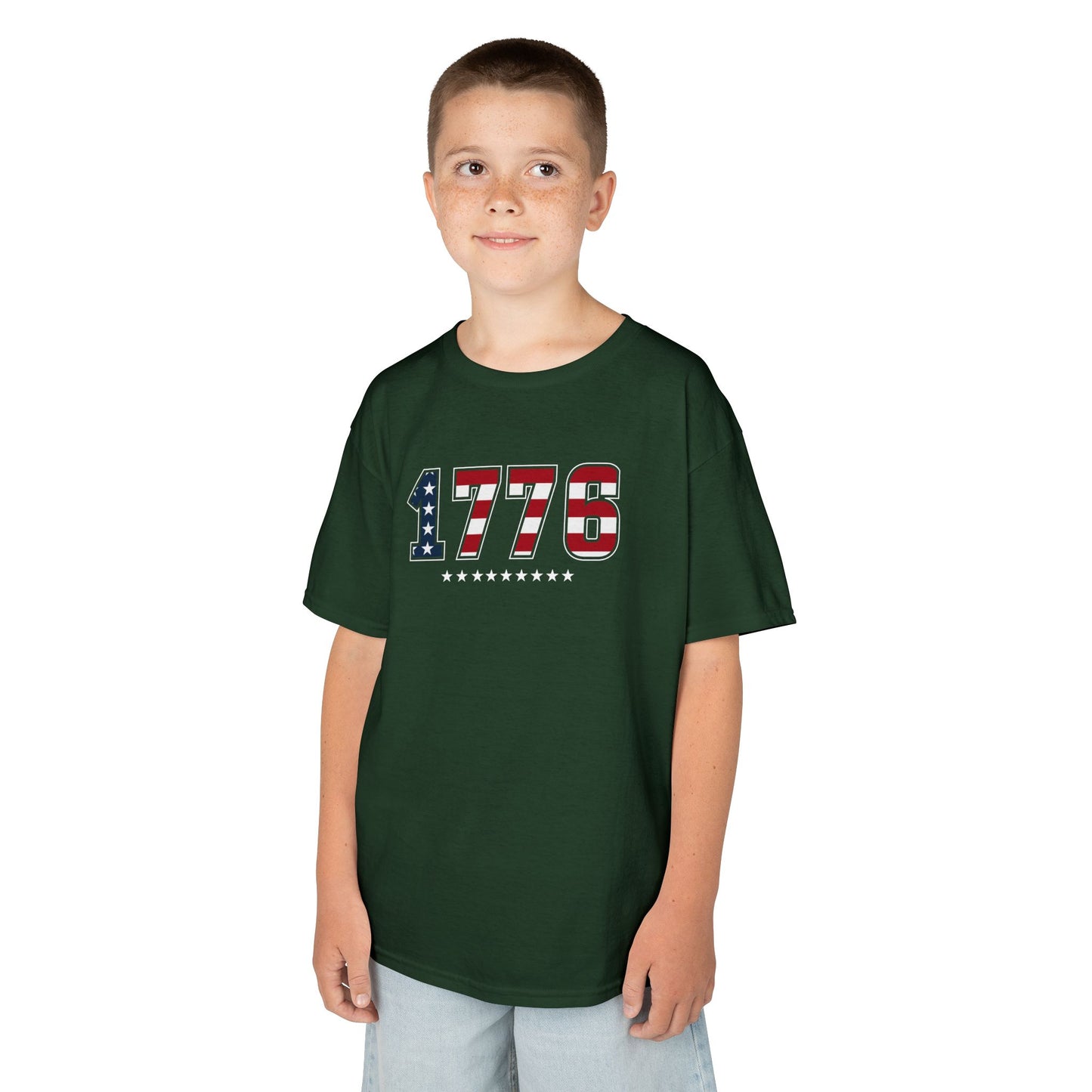 Child wearing a black t-shirt with a motivational message on a white background