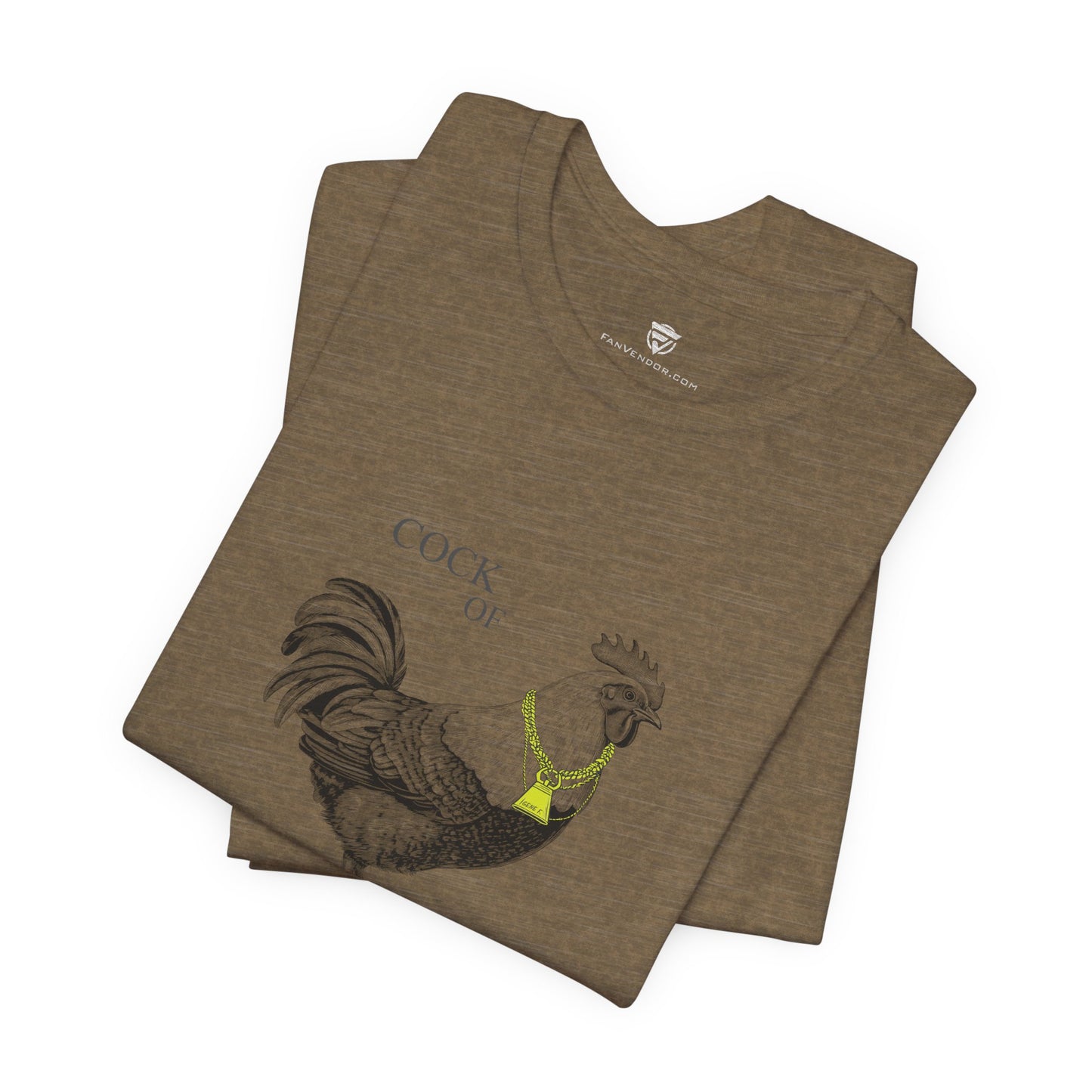 Folded brown t-shirt with rooster design and 'Cock' text on a white background