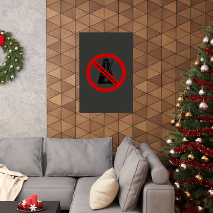 Living room with a gray sofa, Christmas tree, and wall art featuring a no sign.