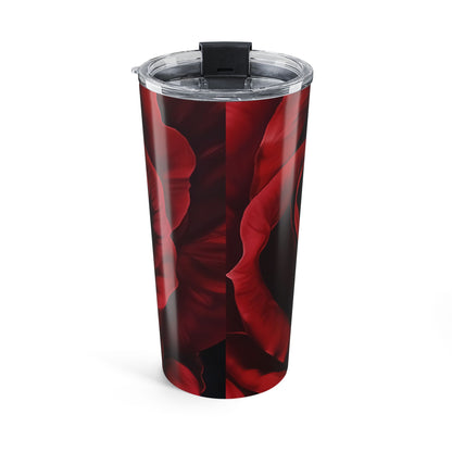 Red and black floral-patterned tumbler on a white background
