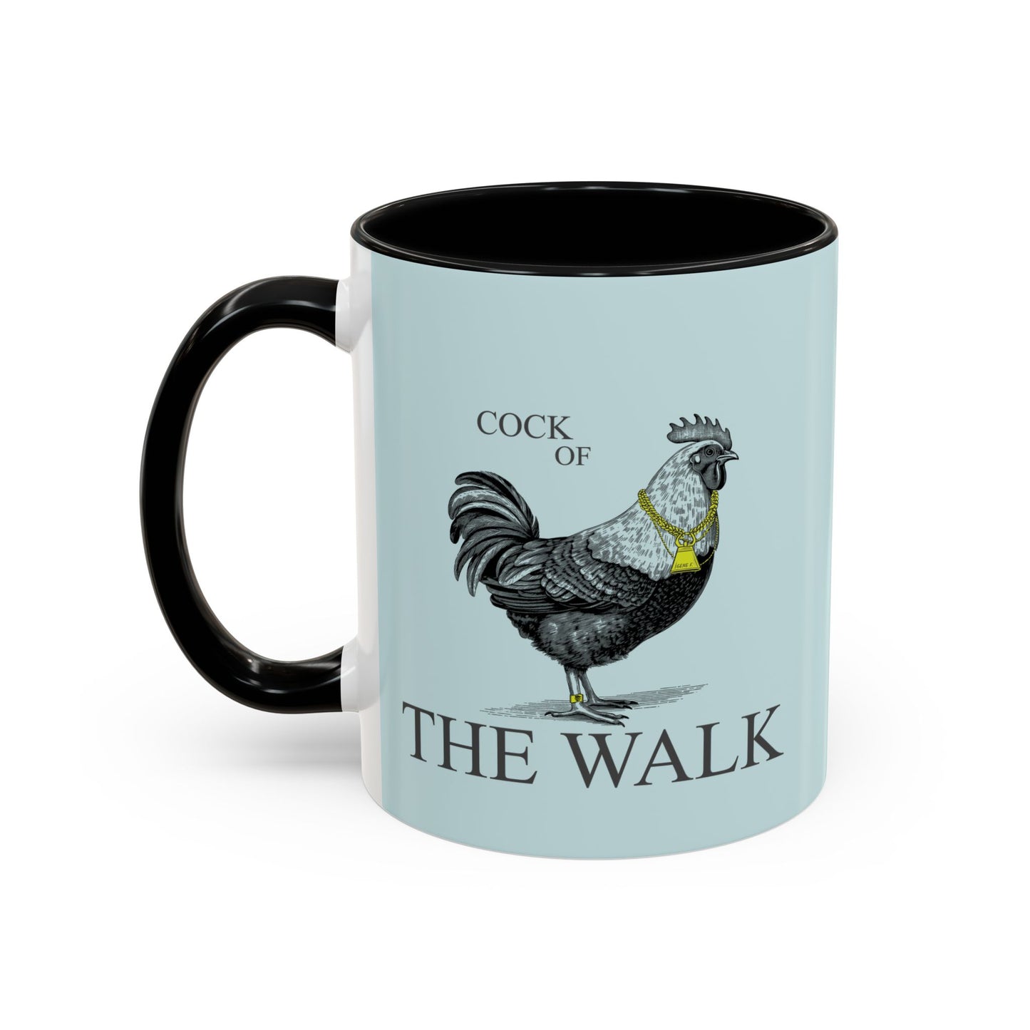 Mug with a rooster illustration and 'Cock of the Walk' text on a light blue background