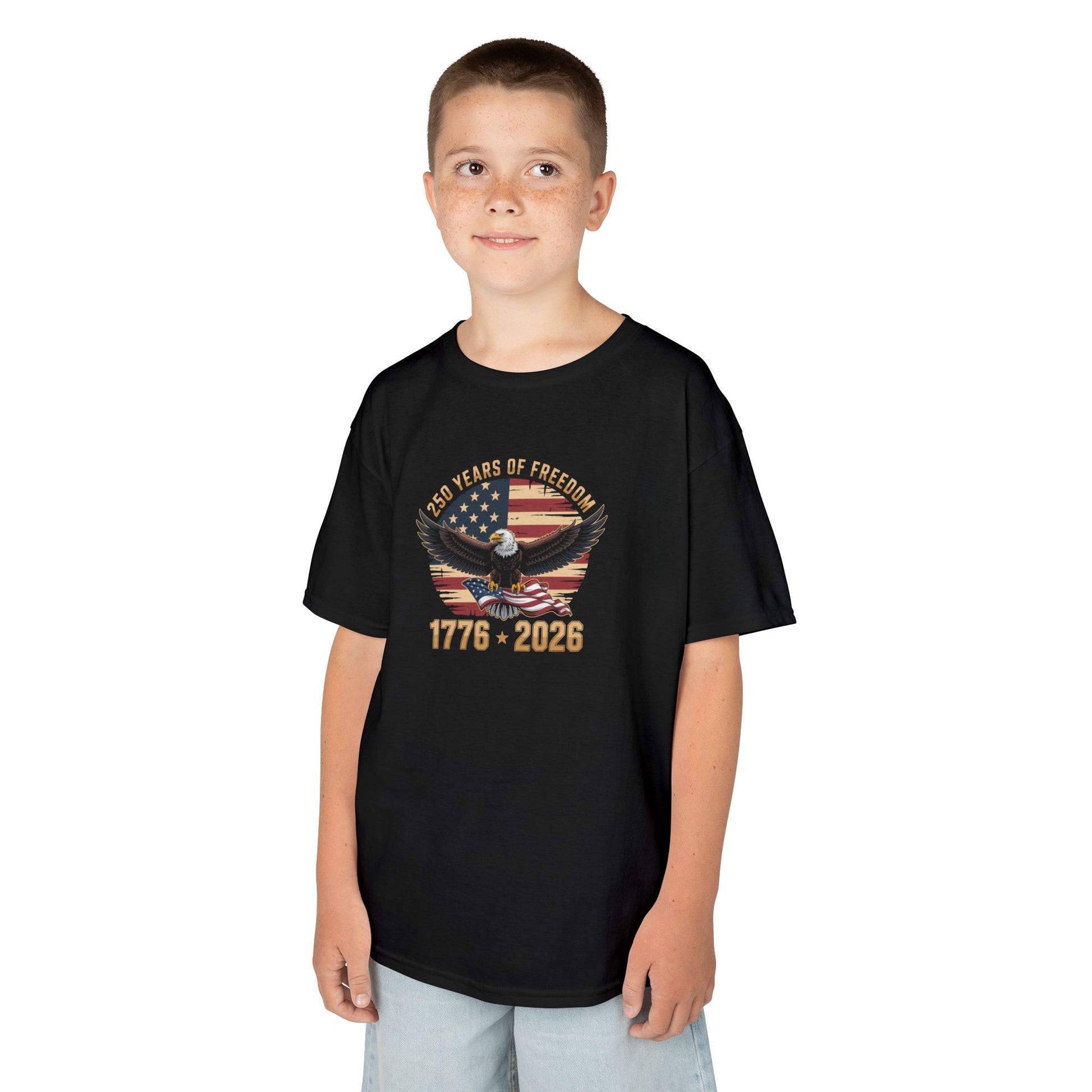 Child wearing a black t-shirt with a graphic design on a white background