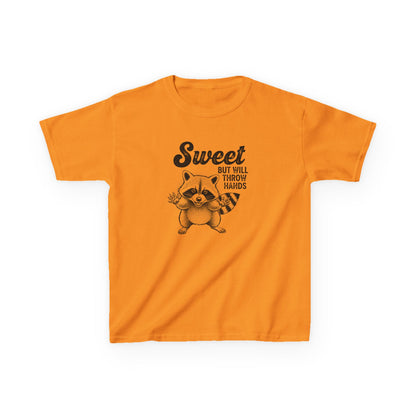 Orange t-shirt with a raccoon graphic and text on a white background