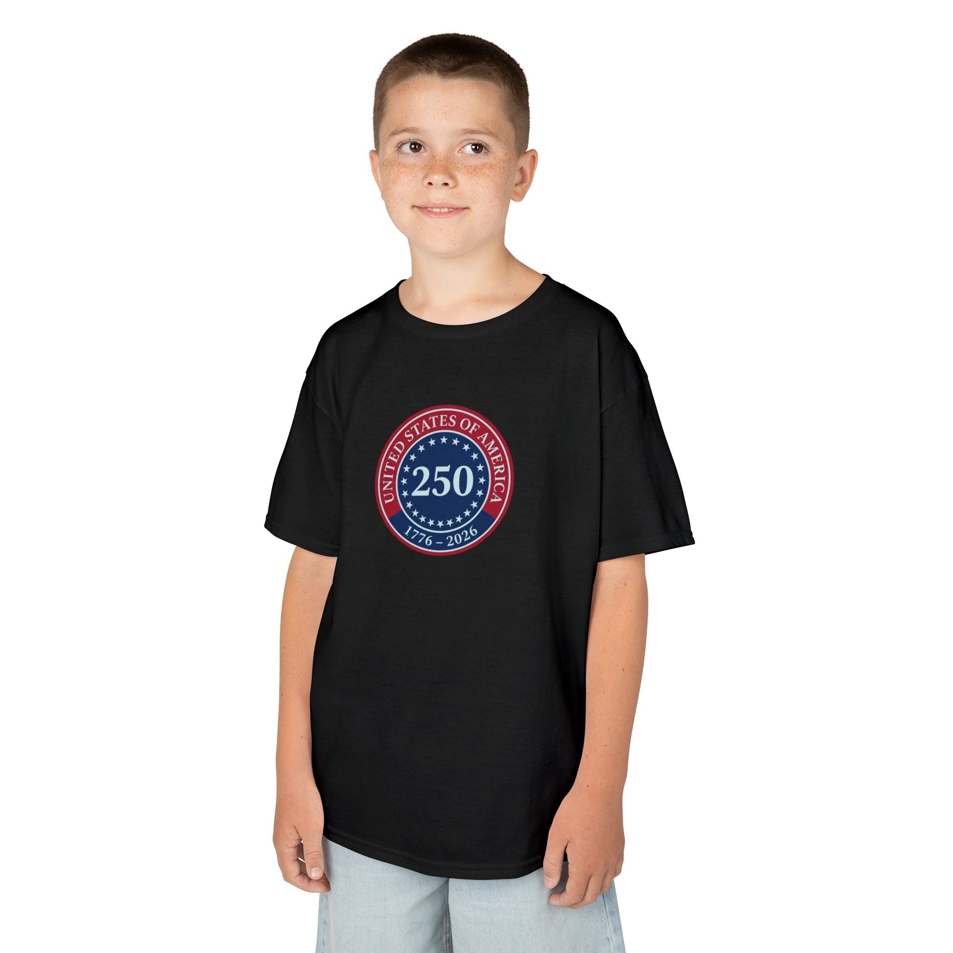 Child wearing a black t-shirt with a colorful graphic design on a white background