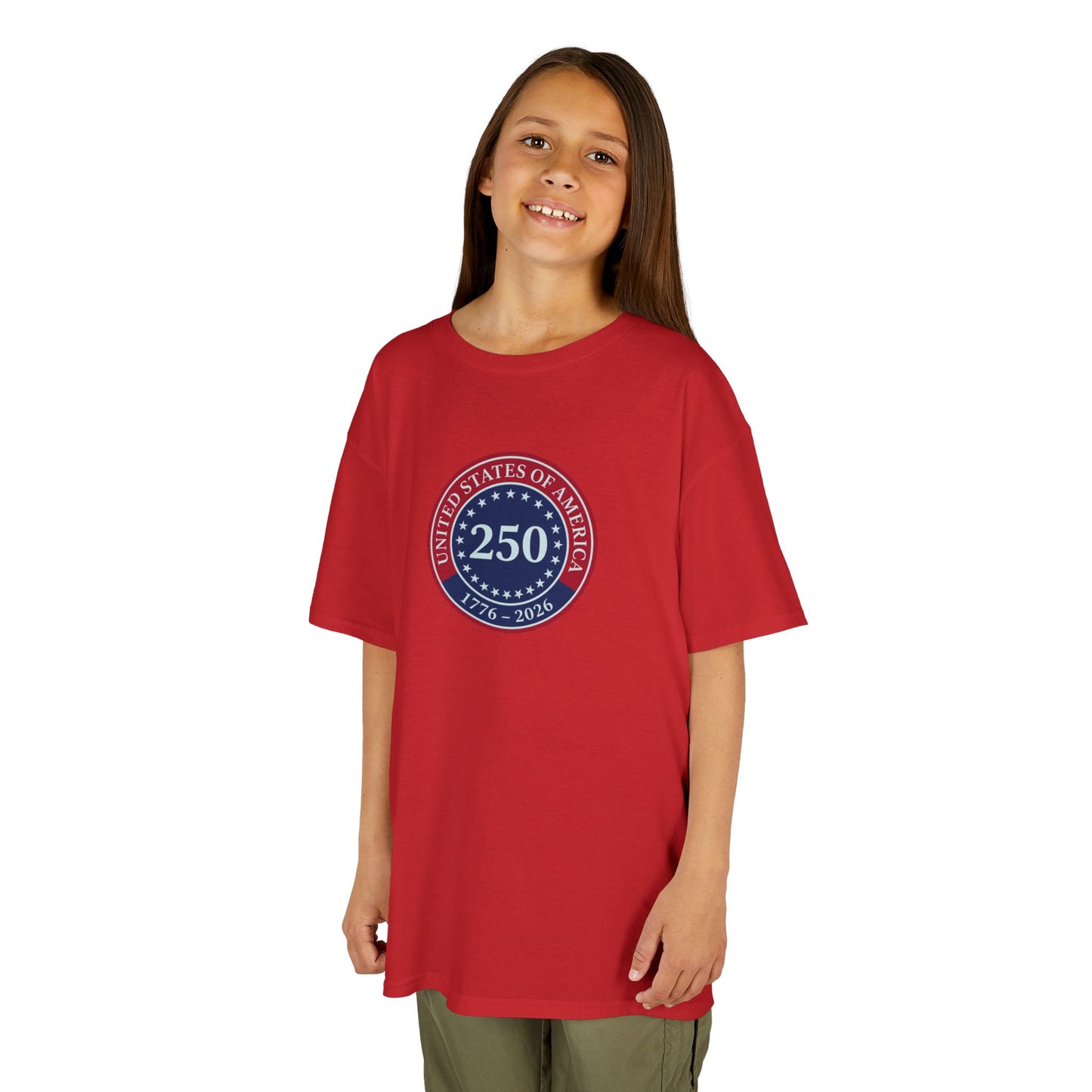 Child wearing a red t-shirt with a blue and white emblem on a white background