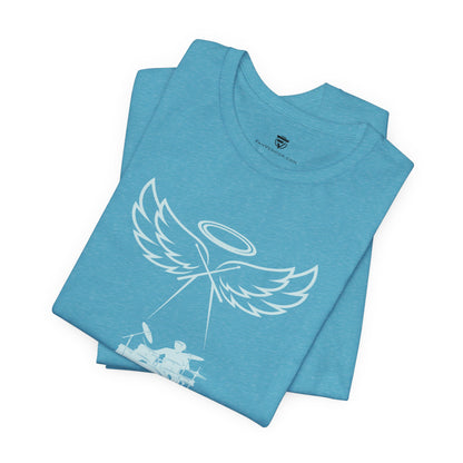 Folded blue t-shirt with angel design on a white background