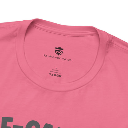 Close-up of a pink t-shirt with 'FanVendor.com' logo and text 