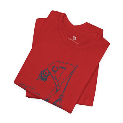 Folded red t-shirt with a graphic design on a white background
