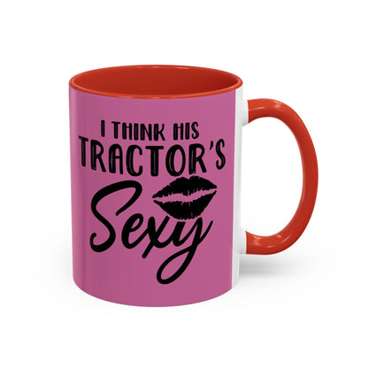 Pink mug with red interior and handle featuring text and a lipstick kiss mark on a white background