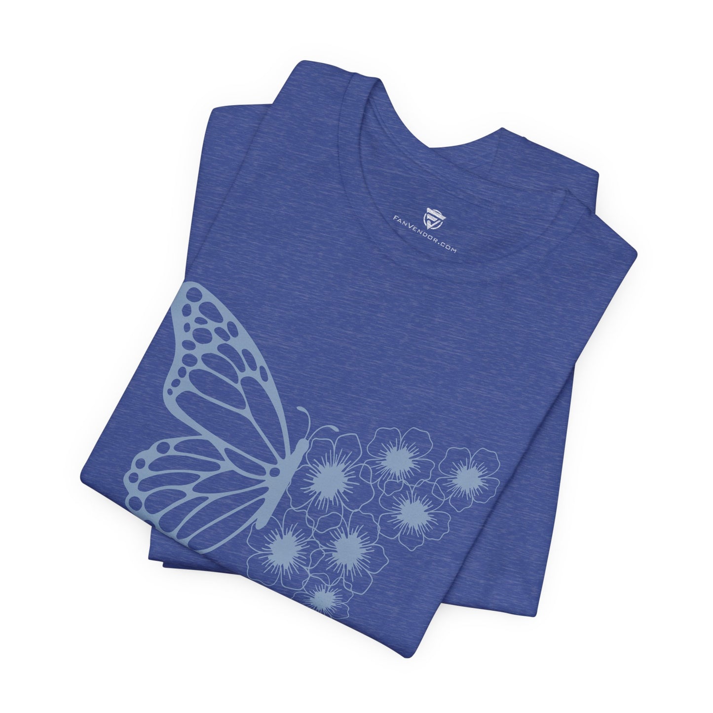 Folded blue t-shirt with butterfly and flower design on a white background