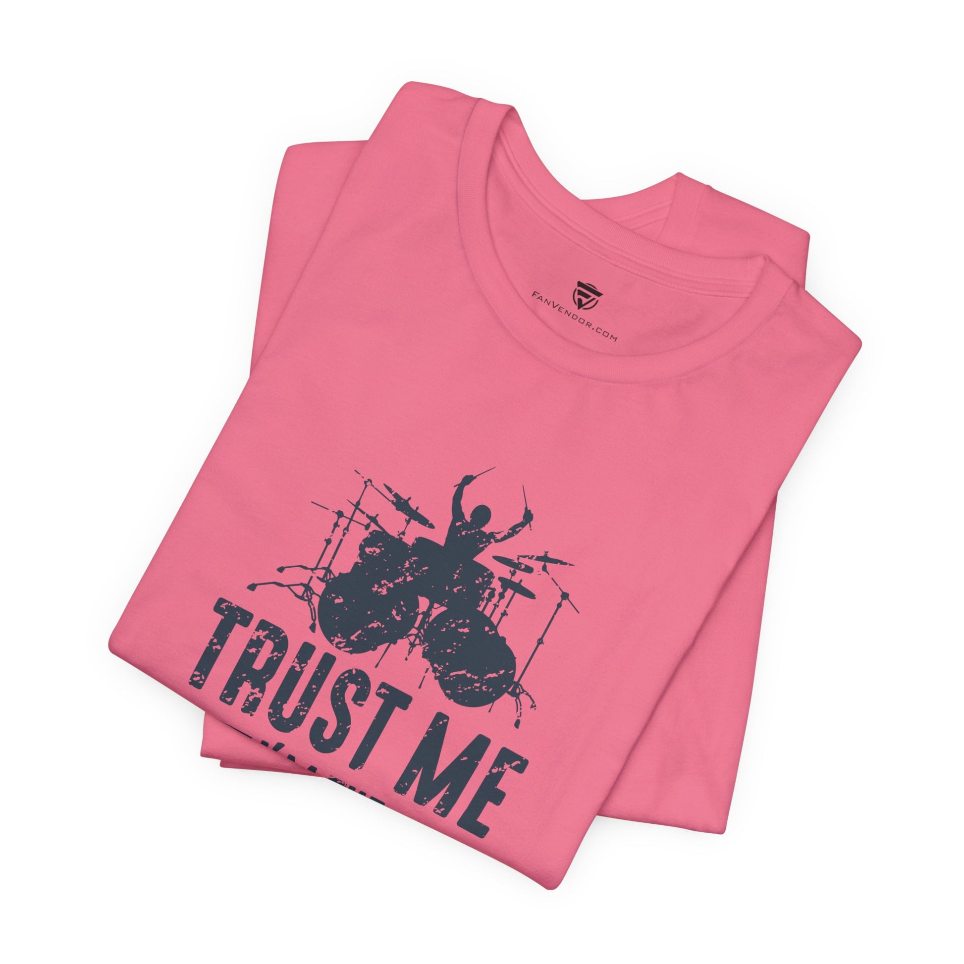 Pink t-shirt with black graphic and 'Trust Me' text 