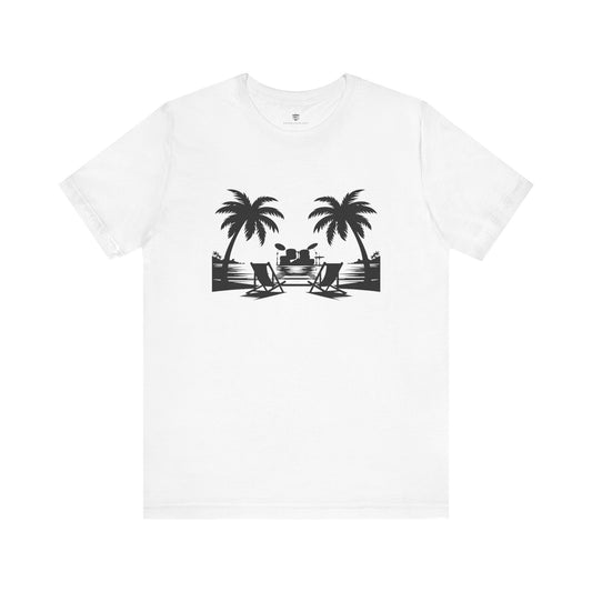 White t-shirt with black palm tree and beach chair graphic on a white background