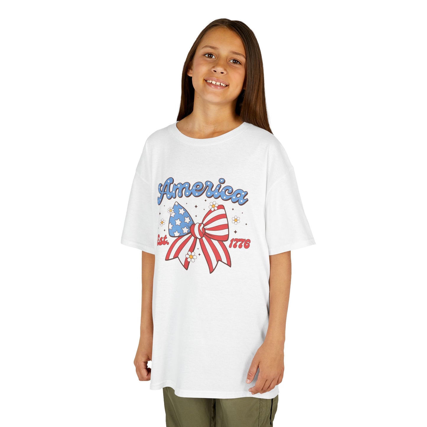 Girl wearing a white t-shirt with a graphic design on a white background