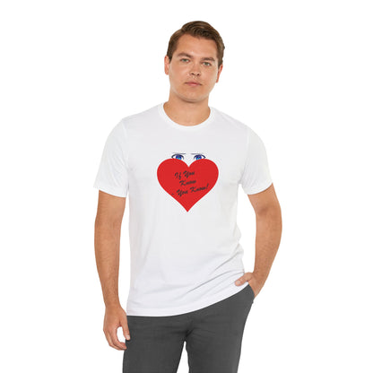 Man wearing a white t-shirt with a red heart graphic and text on a white background