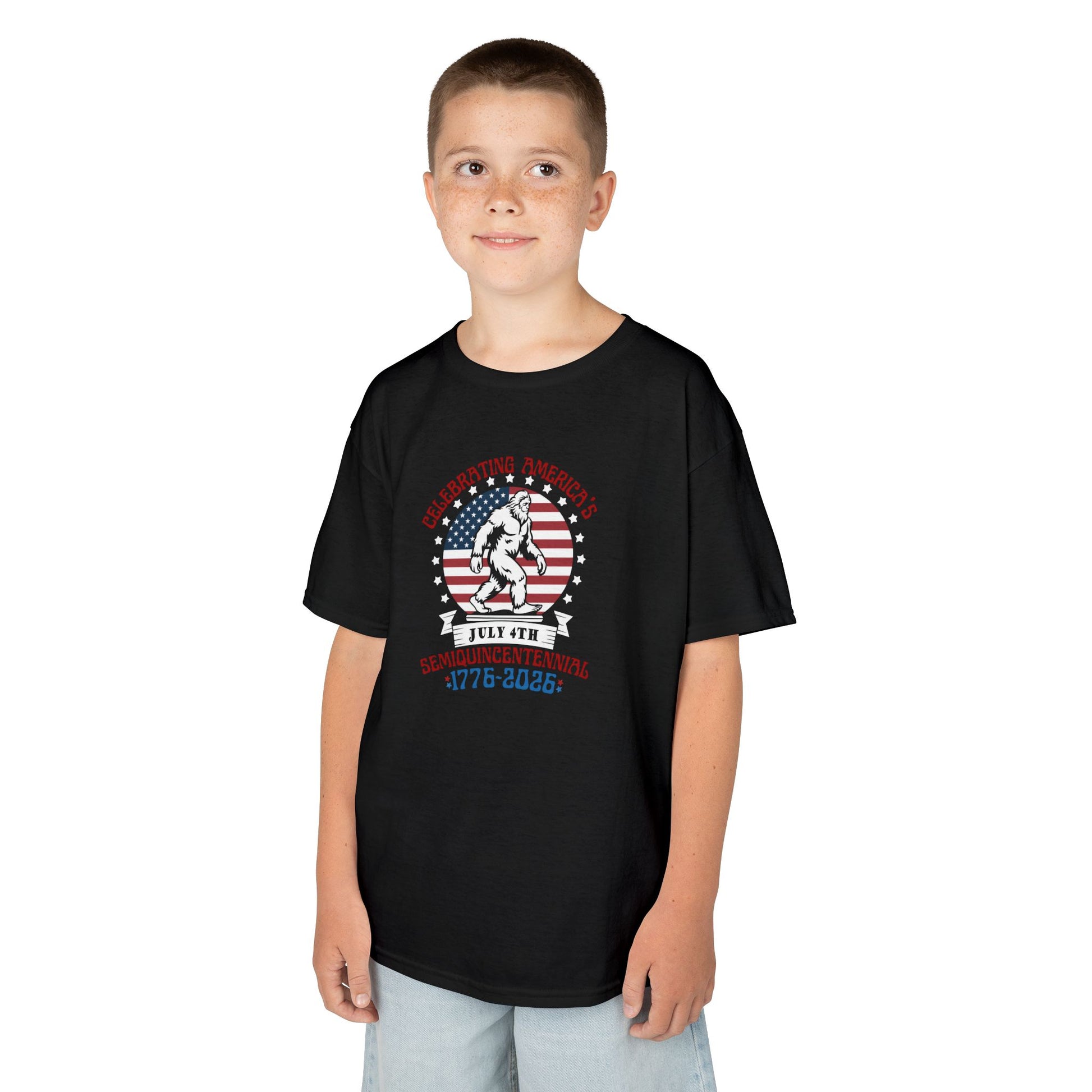 Child wearing a black t-shirt with a graphic design on a white background