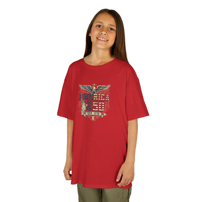 Child wearing a red t-shirt with a graphic design on a white background