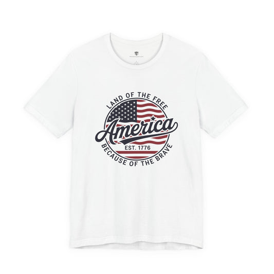 White t-shirt with American flag graphic and text on a white background