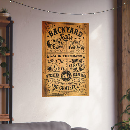 Poster with 'Backyard Rules' text on a wall in a room with plants and a shelf.