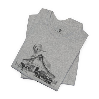 Gray t-shirt with a graphic of a barn and windmill 