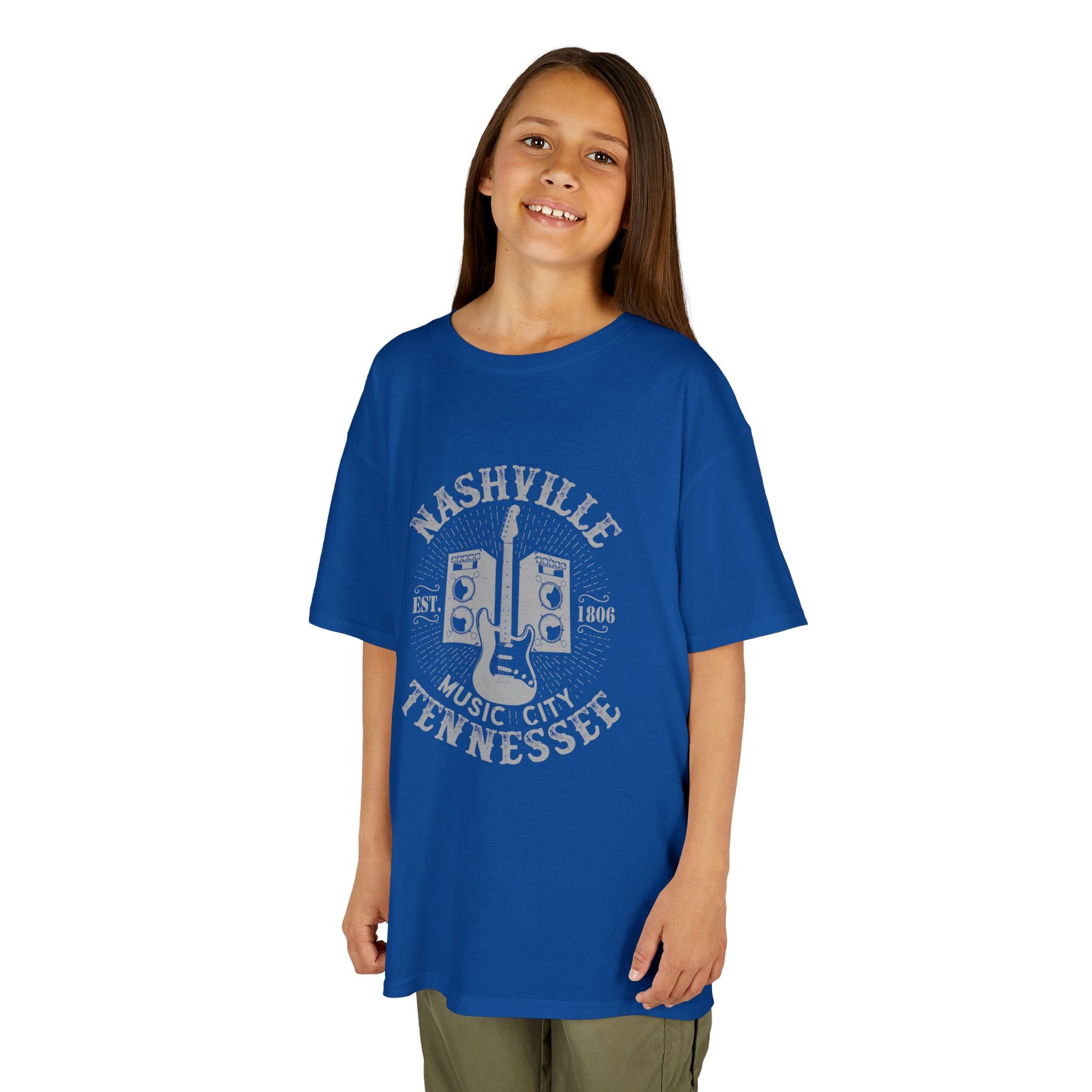 Child wearing a blue t-shirt with design on a white background