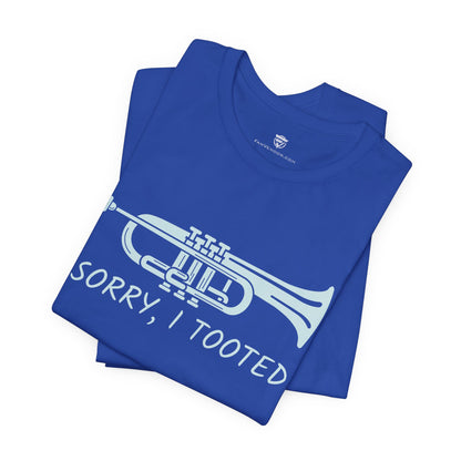 Blue t-shirt with a trumpet graphic and text 'Sorry, I Tooted' on a white background