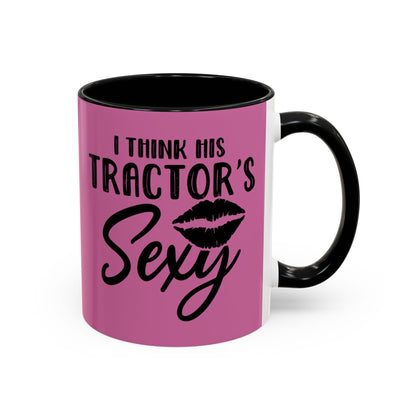 Pink mug with black text and handle on a white background