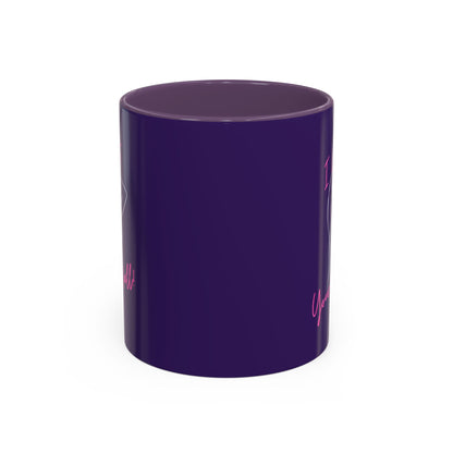 Purple cylindrical mug with pink text on a white background