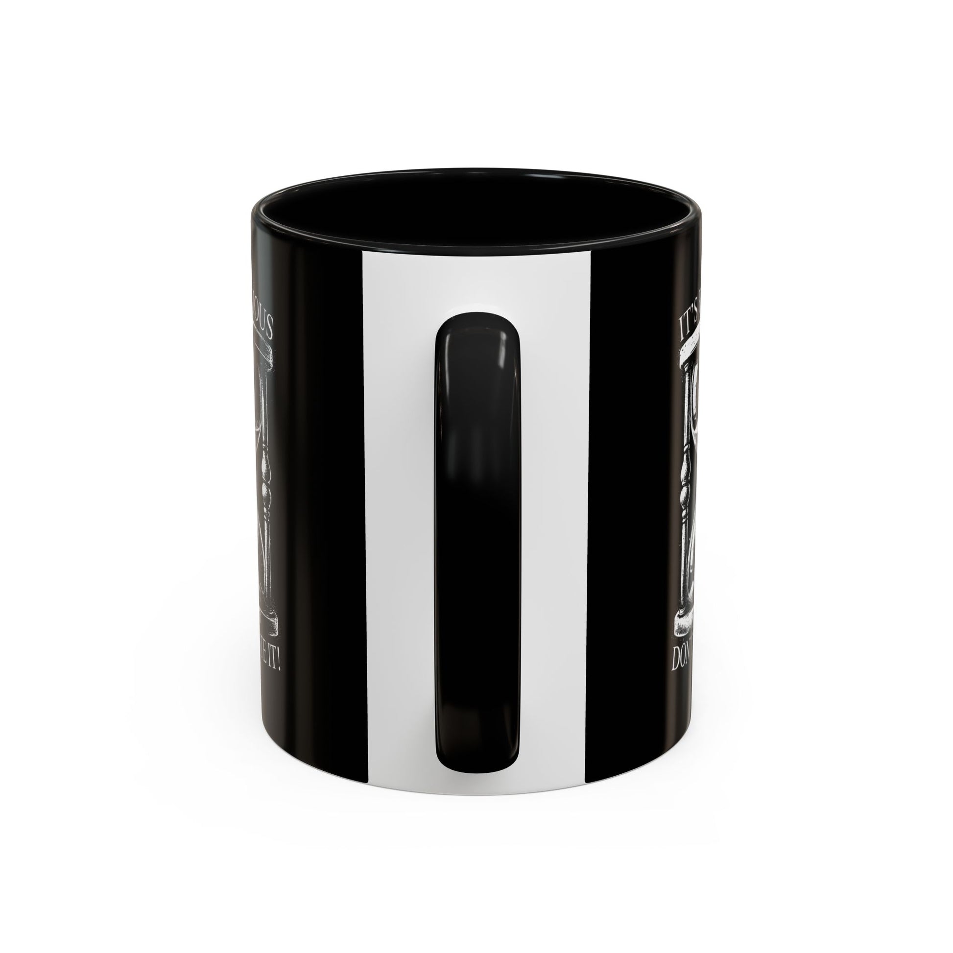 Black and white striped mug on a white background