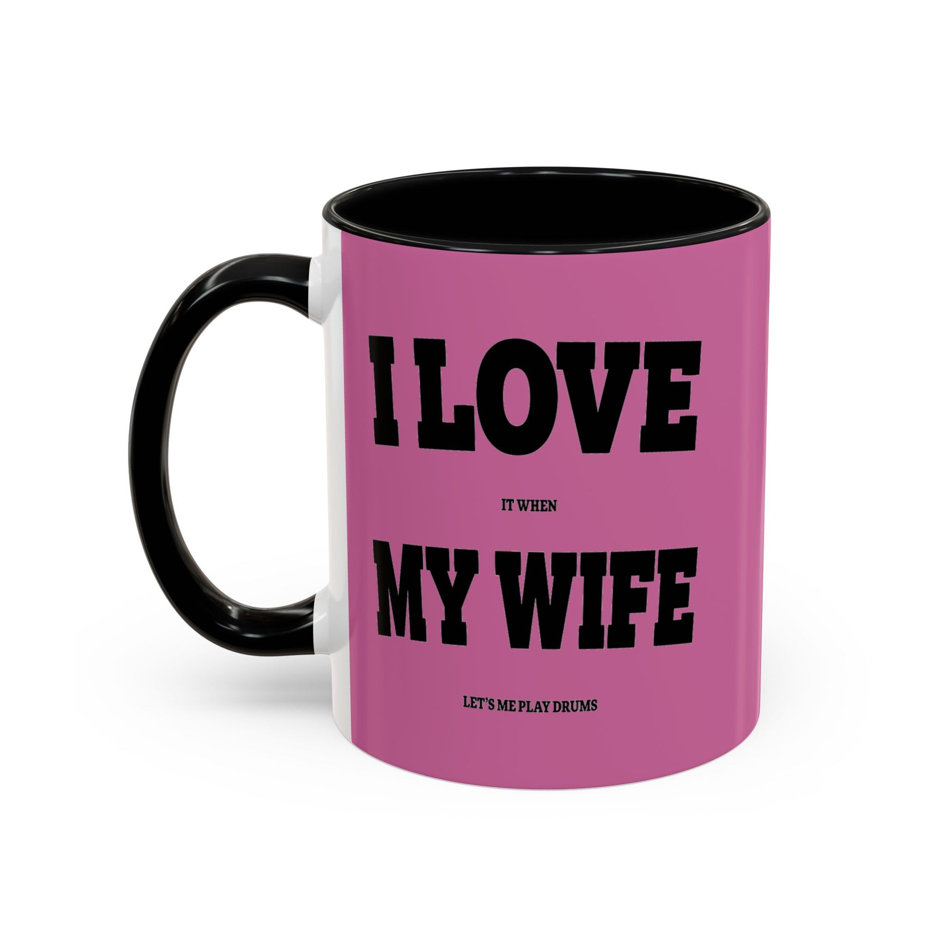 Pink mug with black text and handle on a white background