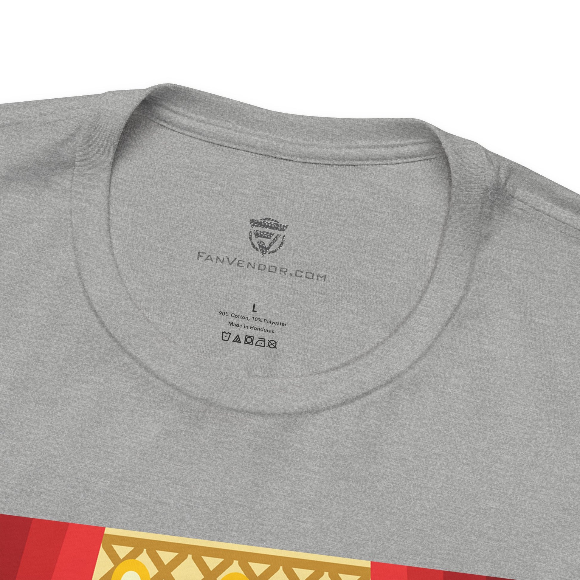 Gray t-shirt with a brand logo and text on the collar, featuring 'Fanvendor.com'.